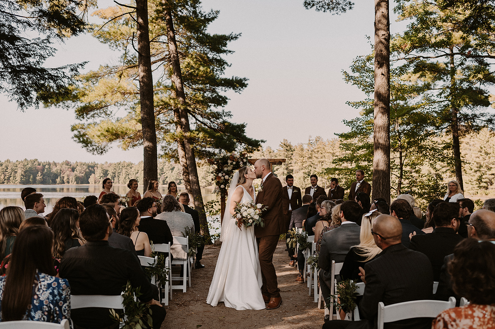 Bride & Groom walking down the aisle at Rocky Crest Resort waterfront ceremony Muskoka
