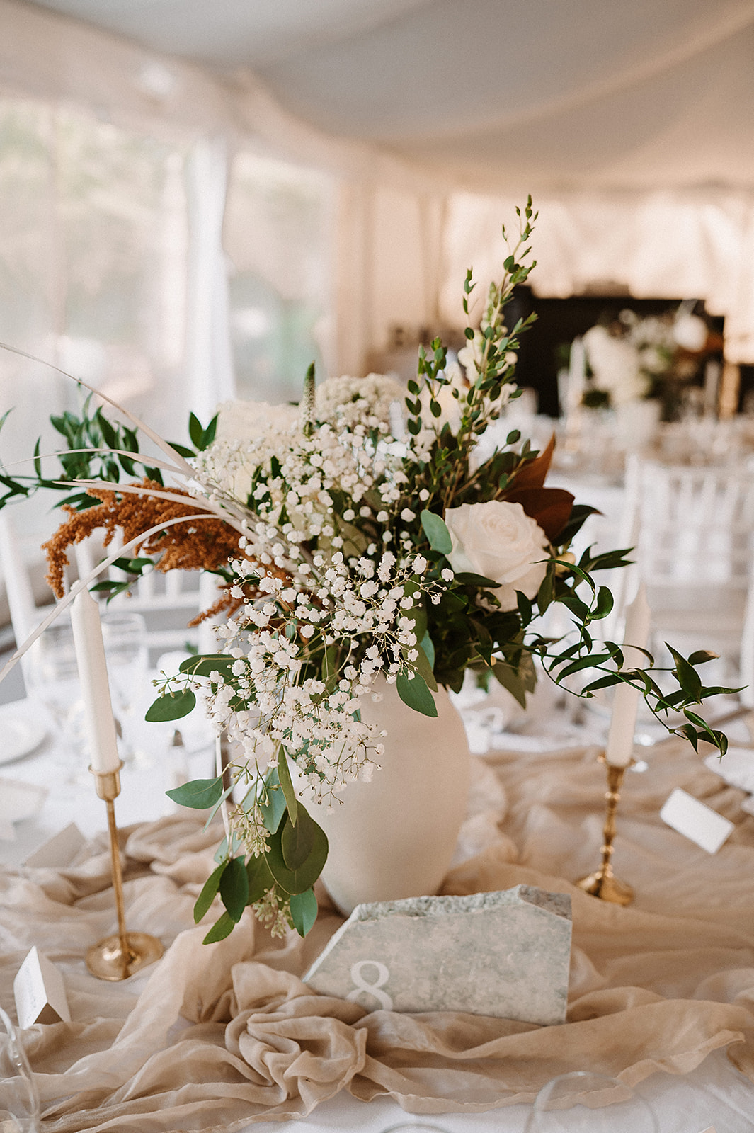 Reception setup with florals by Flower Child Muskoka at Rocky Crest Resort
