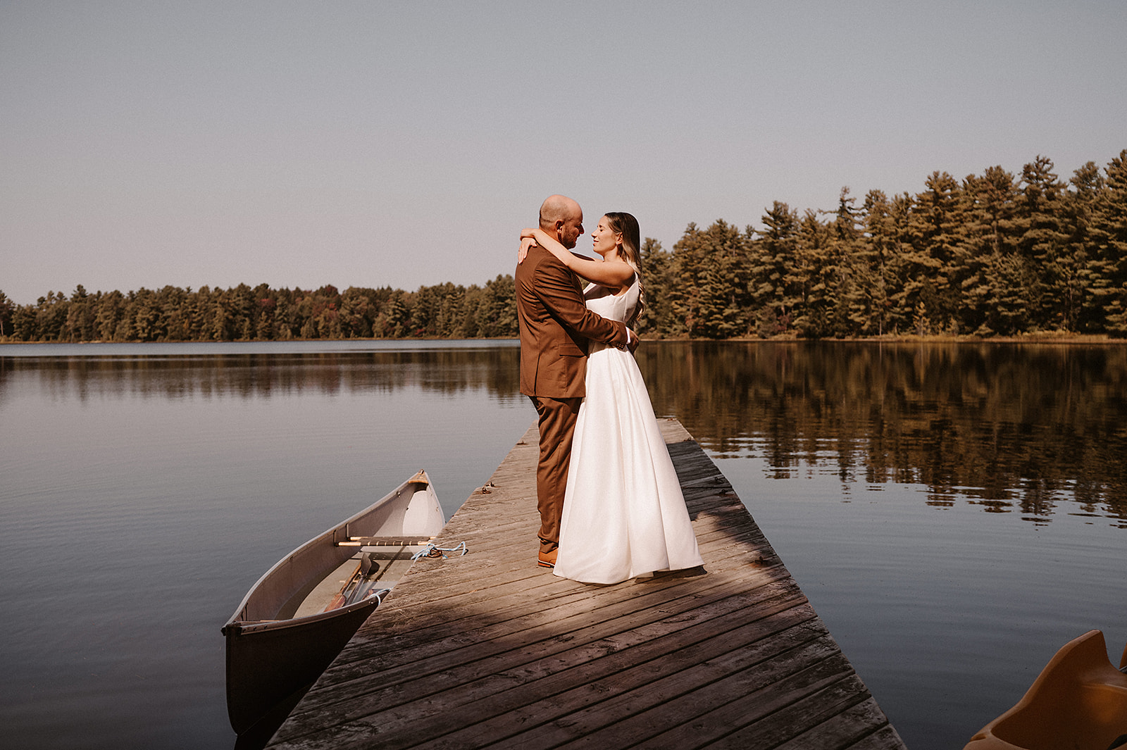 Romantic waterfront wedding portraits in Muskoka Ontario